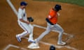 Astros designated hitter Yordan Alvarez scores on a wild pitch by Rangers starting pitcher Max Scherzer during the second inning of Wednesday’s Game 3 of the ALCS.