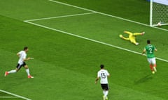 Leon Goretzka, left, scores Germany’s opening goal against Mexico in the Confederations Cup semi-final.