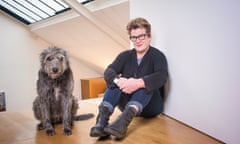 Meg Rosoff at home with one of her dogs