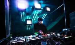 DJ at the decks at Khidi, a nightclub in a former industrial space in Tbilisi, Georgia.