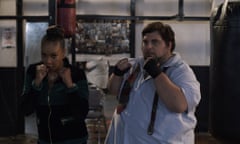 Vivica A Fox and Tim Realbuto in boxing stances in a scene from the film Bobcat Moretti