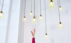 hand reaching for lighbulbs