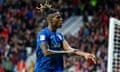 Nico Williams taps his arm in front of the South Stand after scoring shortly after the abuse directed at him