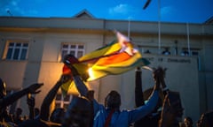 Harare residents celebrate in the streets after the resignation of Zimbabwe’s president Robert Mugabe.