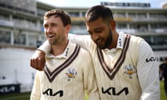 Ryan Patel walks with his arm around Cameron Steel at the Kia Oval