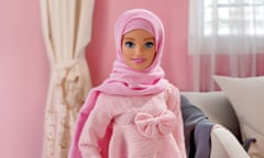 A doll, called Hijarbie, dressed in pink dress and hijab