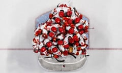 China's players celebrates victory over Denmark during the women's preliminary round ice hockey.