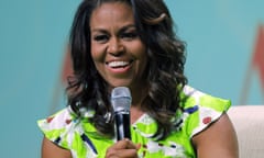 FILE - In this June 22, 2018 file photo, former first lady Michelle Obama speaks at the American Library Association annual conference in New Orleans. Obama is launching a book tour to promote her memoir “Becoming,” a tour featuring arenas and other performing centers to accommodate crowds likely far too big for any bookstore. (AP Photo/Gerald Herbert)