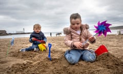 Caitlin and younger brother Jim playing on South Bay beach, Scarborough.