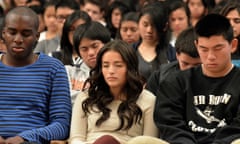 Students meditating in class.