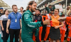 Sebastian Vettel is greeted during the drivers’ parade at Abu Dhabi on Sunday as fans hold a ‘danke Seb’ sign in the background.