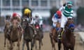 Jockey Flavien Prat celebrates after Flightline wins the Breeders' Cup Classic