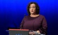 woman speaking at a lectern