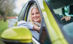 A teenage driver in her car