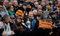 Newport County fans hold a banner targeting Manchester United’s Harry Maguire