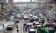 busy street scene in Phnom Penh, Cambodia on 18 March 2024