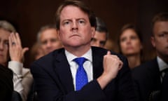 FILE PHOTO: White House Counsel Don McGahn listens to Supreme Court nominee Brett Kavanaugh as he testifies before the US Senate Judiciary Committee on Capitol Hill in Washington, DC, U.S., September 27, 2018. Saul Loeb/Pool via REUTERS/File Photo