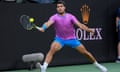 Carlos Alcaraz plays a shot as he defeated Jannik Sinner to move into the BNP Paribas Open tennis final in Indian Wells.