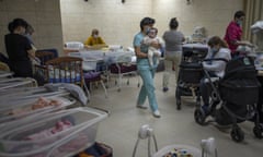 Nannies take care of newborn babies in a basement converted into a nursery in Kyiv, Ukraine. (Rodrigo Abd/AP Photo)