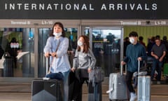 Passengers arrive on a flight from Asia, at Los Angeles International Airport, California, on February 2, 2020.