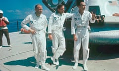 Apollo 11 astronauts stand next to their spacecraft in 1969, from left to right: Col. Edwin E. Aldrin, lunar module pilot; Neil Armstrong, flight commander; and Lt. Michael Collins, command module pilot. (AP Photo)