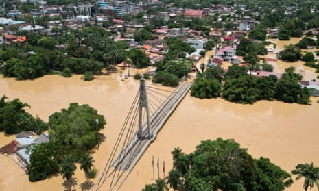 Floods submerge cities in central South America after extreme rainfall – video