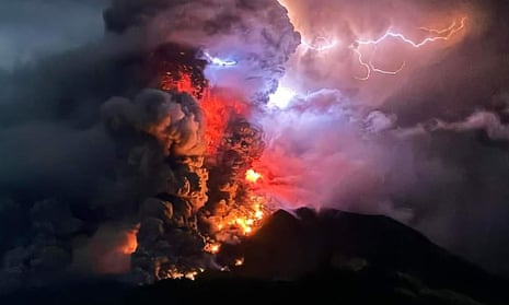 Mount Ruang eruption in Indonesia sparks tsunami fear as hundreds evacuate – video