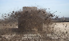 Rear view of tractor muck spreading over field of stubble. Image shot 02/2008. Exact date unknown.<br>ARANXX Rear view of tractor muck spreading over field of stubble. Image shot 02/2008. Exact date unknown.