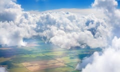 White cumulus fluffy clouds in the sky.