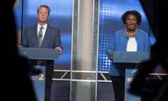 Brian Kemp and Stacey Abrams in their televised debate in Atlanta on Sunday.