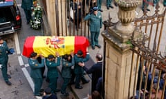 Guardia Civil officers carry the coffin of their colleague David Perez Carracedo during his funeral in Pamplona city in northern Spain.