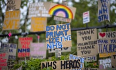 Signs in support of the NHS are seen in East London.