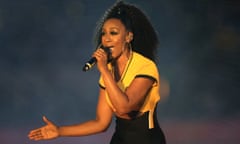 Beverley Knight performing on stage in yellow tshirt