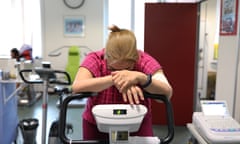 Sandra Cabreras, 57, rides on an exercise bike to strengthen muscle tone at a rehabilitation clinic in Genoa, Italy. (Photo by Marco Di Lauro/Getty Images)