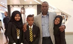 Idris Hamud with three of his children