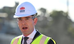 NSW Premier Dominic Perrottet speaks to media over looking the WestConnex Rozelle Interchange during a press conference in Sydney