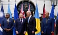 Joe Biden,Mark Brown,James Marape,Taneti Maamau<br>President Joe Biden talks with Cook Islands Prime Minister Mark Brown, second from left, as he poses for a family photo with Pacific Islands Forum leaders at the White House in Washington, Monday, Sept. 25, 2023. Papua New Guinean Prime Minister James Marape, left, and Kiribati's President Taneti Maamau, right, look on. (AP Photo/Susan Walsh)