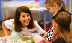 Liz Kendall with school pupils