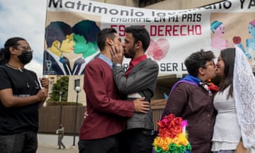 Couples kiss during a protest in favor of same-sex marriage in Caracas, Venezuela.