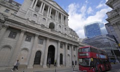 A bus drives past the Bank of England