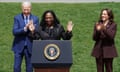 Ketanji Brown receives applause from Joe Biden and Kamala Harris at the White House.