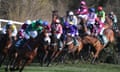 Ucello Conti leads the field at the Canal Turn in Saturday’s Grand National.