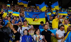 Ukraine fans celebrate after their team's victory over Scotland in the 2022 World Cup qualifier at Hampden Park Glasgow.