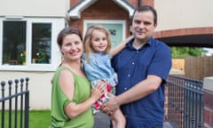 Alina and Krzysztof Sulikowska with their four-year-old daughter Isabella, outside their home in Erdington, Birmingham