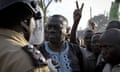 Ugandan police confront opposition leader Kizza Besigye