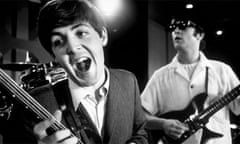 John Lennon and Paul McCartney rehearse during a Beatles tour. Photograph: Bob Gomel/Time Life Pictures/Getty