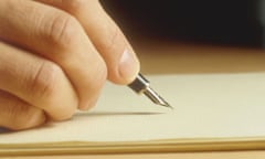 A man's hand writing