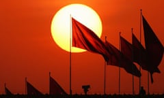 Chinese military personnel watch over Tiananmen Square