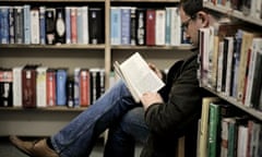 New chapter … a man reading a book at Ventnor library on the Isle of Wight.