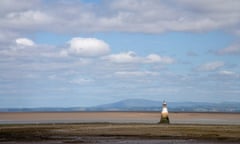 Black cone lighthouse at the entrance to the River Lune, the area known as the Loney